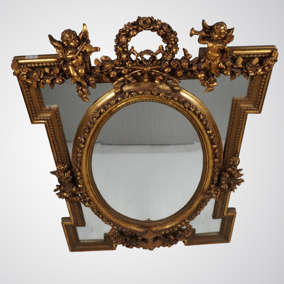 Exquisite Antique Gilded Mirror with Oval Center and Cherub Detailing