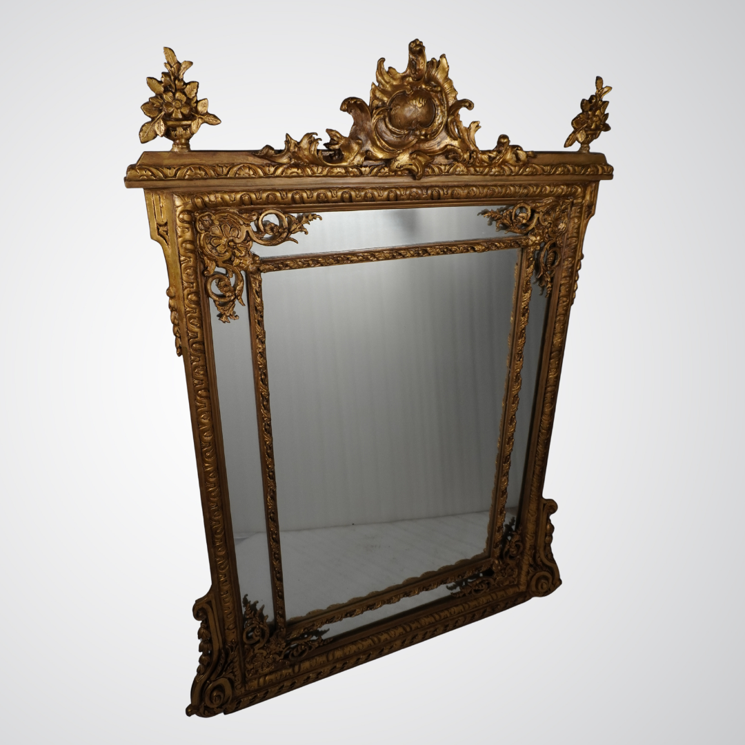 Exquisite Rococo Giltwood Wall Mirror with Ornamental Crest